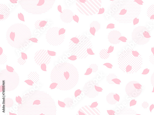 ピンクの桜の花びらとドットとストライプ柄の円のパターン背景
