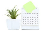 Calendar page with speech bubble and green plant on white background