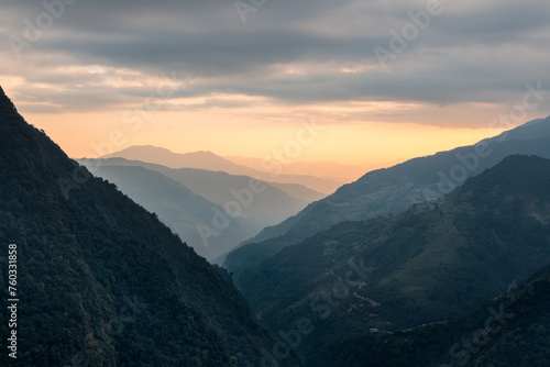 Rolling hills of the lower Himalayas at Annauprna Mountan range in Gandaki province during sunset photo