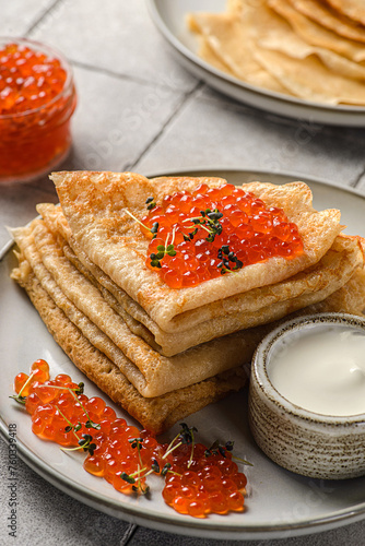 Obraz na plátně crepes with red caviar and sour cream