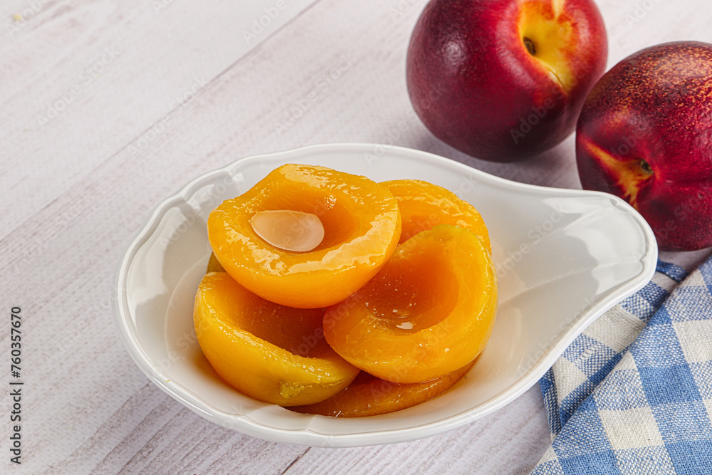 Canned peaches with sweet syrope Canned peaches with sweet syrope