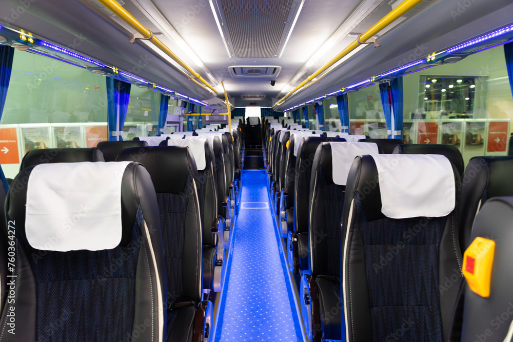 Fototapeta premium Salon intercity bus inside. Gray-blue seats