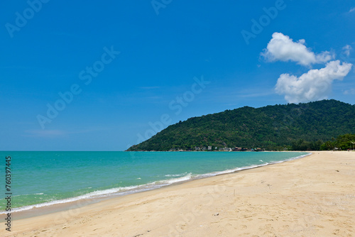 Fototapeta Naklejka Na Ścianę i Meble -  Beautiful wave on the beach, clear water, white sand in your holiday at Khanom beach Nakhon si thammarat Thailand. .Golden sand, white waves and beautiful sea. Good for relaxing