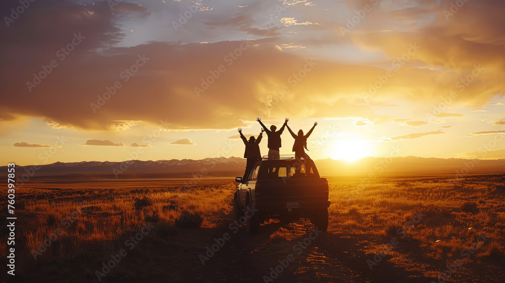 Several individuals are standing on the roof of a car. They appear to be posing or celebrating, creating a unique and potentially dangerous situation - obrazy, fototapety, plakaty 