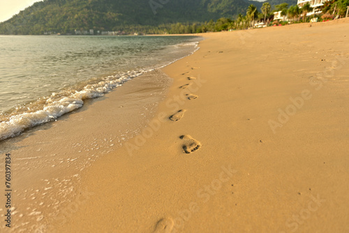 Footprints on the beach with sunny.Small sand molding of the wind crab on the natural beach sand