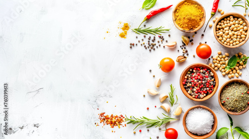 Assorted spices and legumes on white background