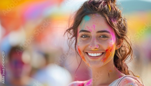 Portrait of a beautiful young woman at the Holi color festival
