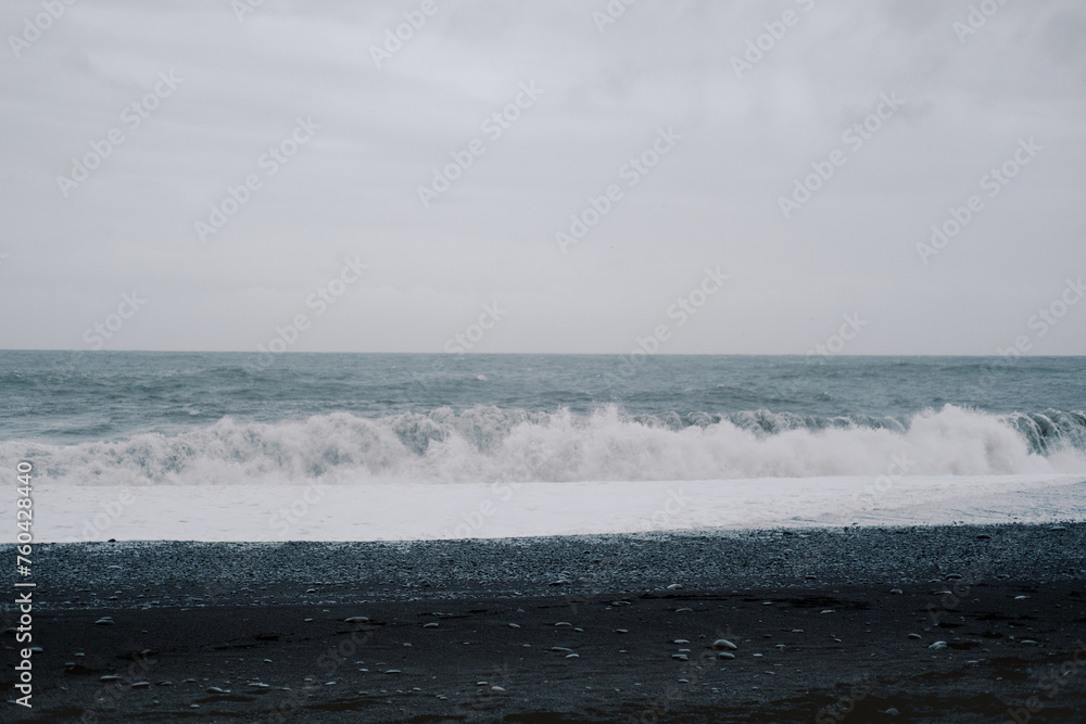 Iceland black sand beach water wave crashing background