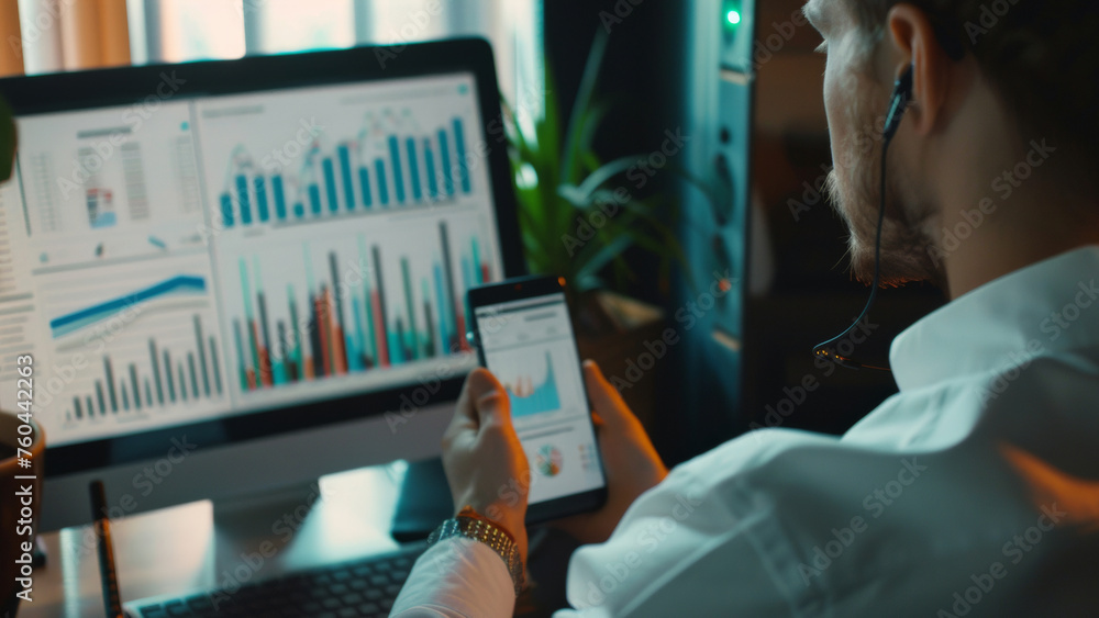 Analyst scrutinizes financial data on multiple screens, immersed in number crunching.