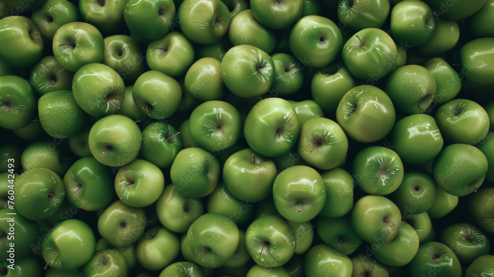 A sea of fresh green apples enveloping the frame in vibrant hues. A sea of fresh green apples enveloping the frame in vibrant hues.