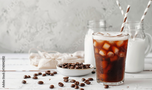 cold brew coffee with milk on white wooden table