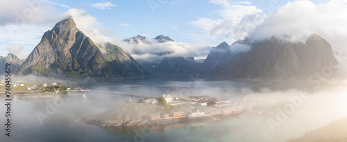 The village of Sakrisøya in Lofoten Islands on a beautiful foggy summer morning, Norway