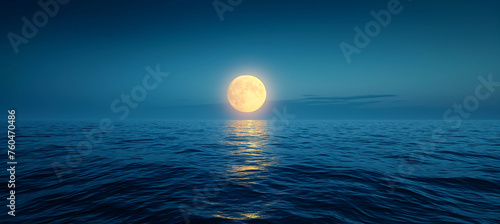 big super full moon over the sea or ocean at night, midnight