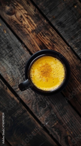 Steaming coffee mug rests on rustic wooden table.