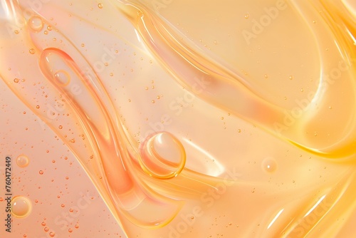 Close Up View of Yellow Liquid pastel peach face serum with bubbles.