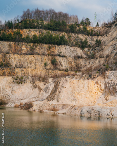 Inundated quarry, ideal for summer days of swimming. Natural phenomenon in Slovakia. Quarry or Sutovske lake. Spring atmospher