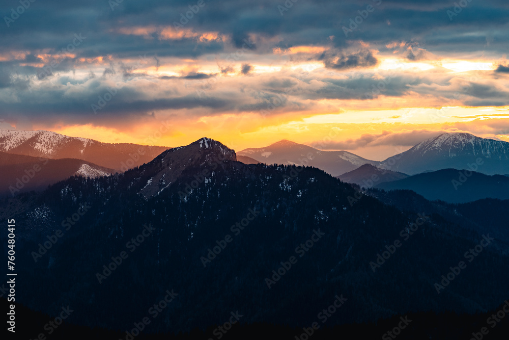 Watercolor paint. Paint effect. Red misty landscape panorama in mountains. Fantastic dreamy sunrise on rocky mountains with view down to foggy misty valley below