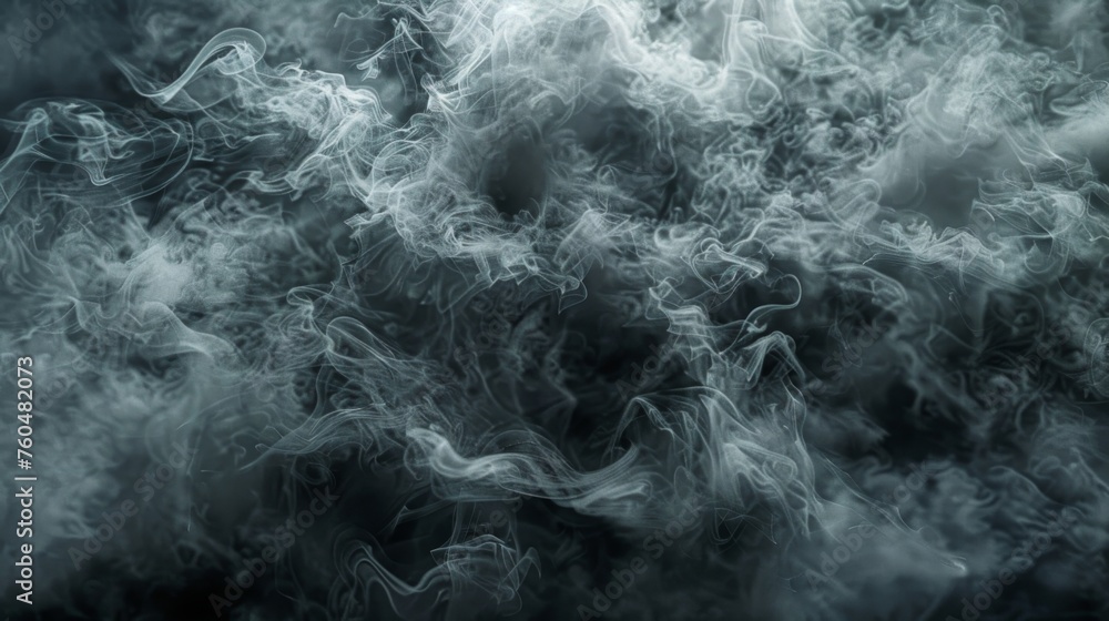 Thick gray smoke swirls and rises in intricate patterns Thick gray smoke swirls and rises in intricate patterns