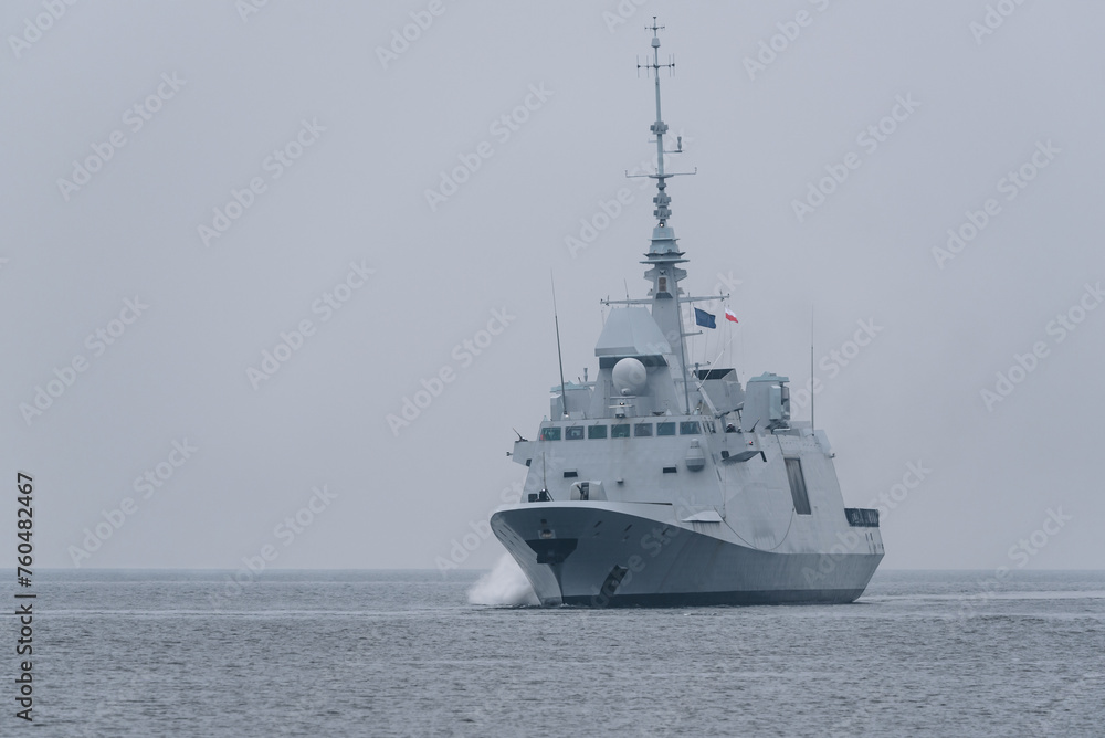 WARSHIP - A modern French Navy frigate sails on the sea
WARSHIP - A modern French Navy frigate sails on the sea