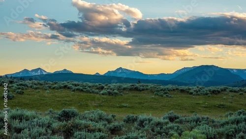 Dawn over the Gallatin Range and Swan Lake Flats, Yellowstone National Park, Wyoming, USA. Time Lapse.  photo
