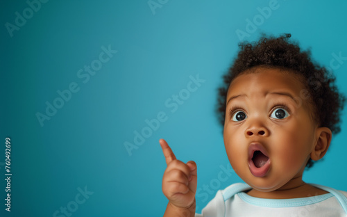 Surprised Baby Pointing At Background Copy Space