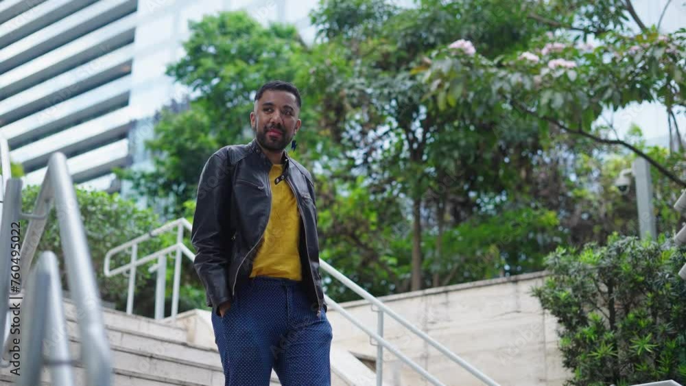 Portrait confident queer fashion man walking in stylish outfit outdoors. Confident queer man outdoors at city. Young business gay man at street.
Portrait confident queer fashion man walking in stylish outfit outdoors. Confident queer man outdoors at city. Young business gay man at street.