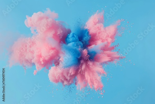 A pink and blue substance is seen floating and swirling through the air, creating a dynamic and colorful display