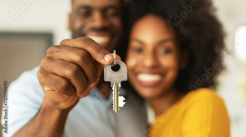Happy young family couple holding keys to new home. Homeowners. Real estate concept. Generative AI