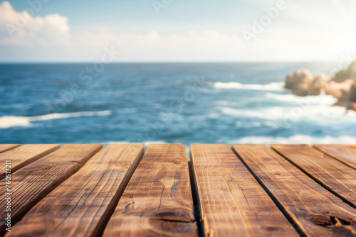 close-up of an empty wooden table and blurred ocean background  mockup background for product display