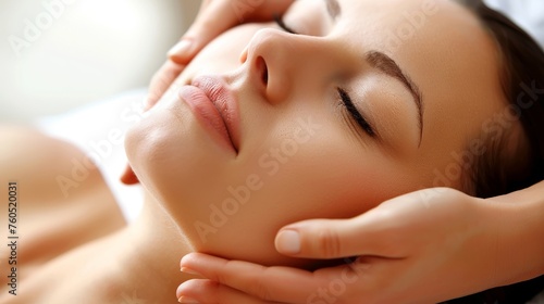 Youthful woman enjoying pampering facial massage at spa salon for beauty treatment