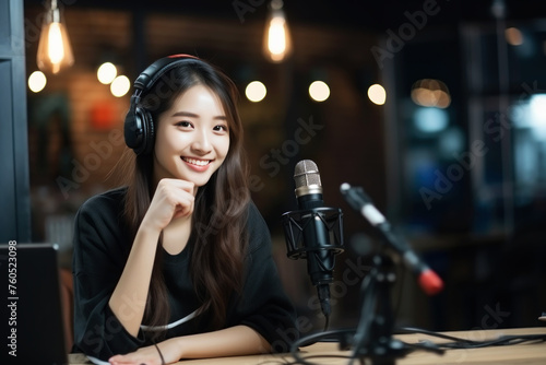 Happy young Asian female live-streaming on social media. Content creator social media concept