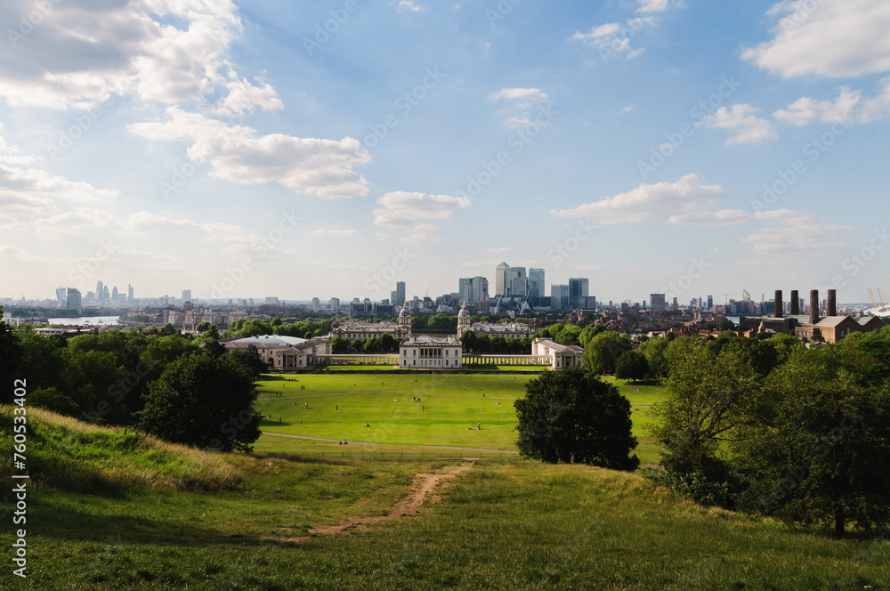 London, England, Panoramic View Of Greenwich and Canary Wharf With Blue Sky And Clouds London, England, Panoramic View Of Greenwich and Canary Wharf With Blue Sky And Clouds