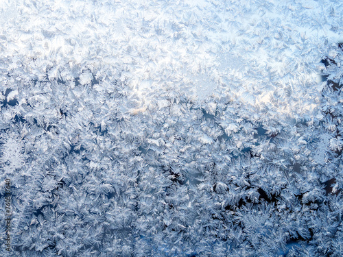 frost pattern on home window glass closeup