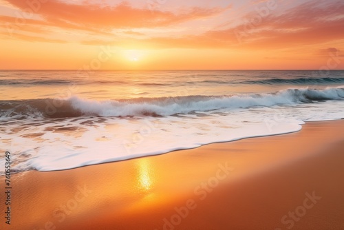 A serene beach at sunset, with the golden rays casting a warm glow on the sand and gently crashing waves. 