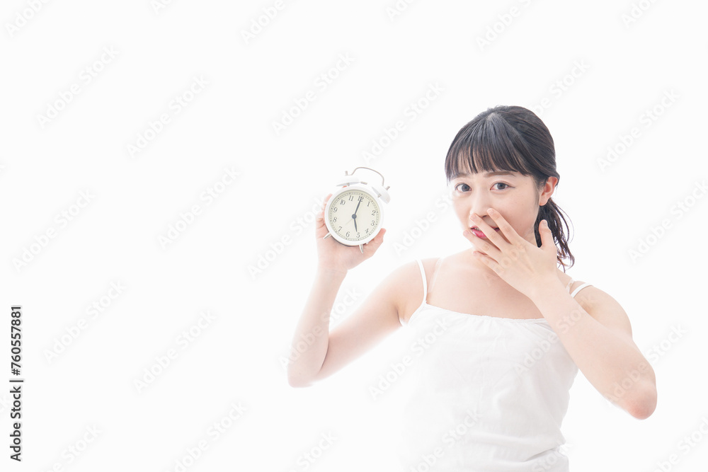 早起きをする若い女性 早起きをする若い女性