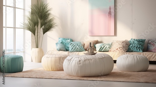 Cream Pouf with Soft Pink and Teal Throw Cushions. © Aeman