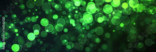 green bokeh background, Abstract green glowing lights bokeh on a black background, . A green light abstract background with defocused light particles and circles,banner design
