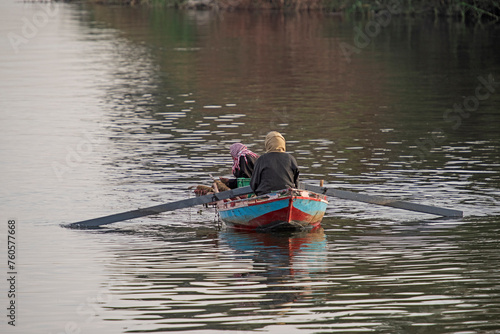 Traditional egyptian bedouin fisherman on river