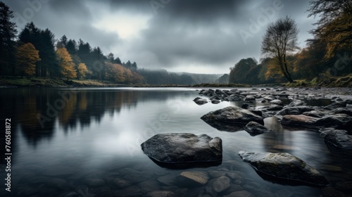 Tranquil river under cloudy sky in soft light