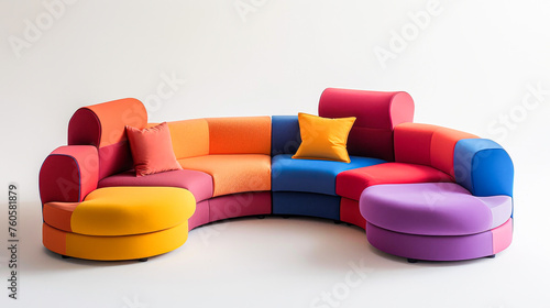 A colorful couch with pillows and a pillowcase. The couch is made up of different colored pieces, and the pillows are also colorful. The couch is arranged in a circle © Kowit
