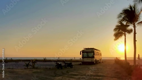 Camper bus car at sunset in Puerto Escondido Oaxaca Mexico. photo