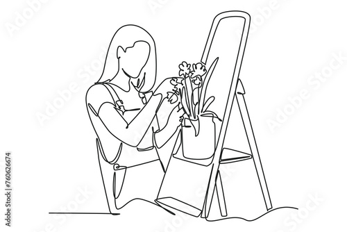 Single one line drawing of woman gardener in glasses wearing overalls, taking care for plants. Farming challenge minimal concept. Continuous line draw design graphic vector illustration.