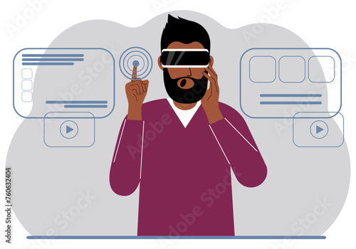 A man wearing a virtual reality headset studies, works, plays and works.