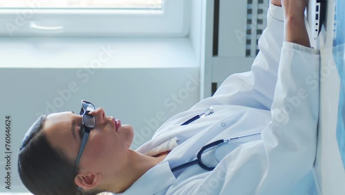Professional medical doctors working in hospital office making computer research. Medicine, healthcare and technology concept. photo