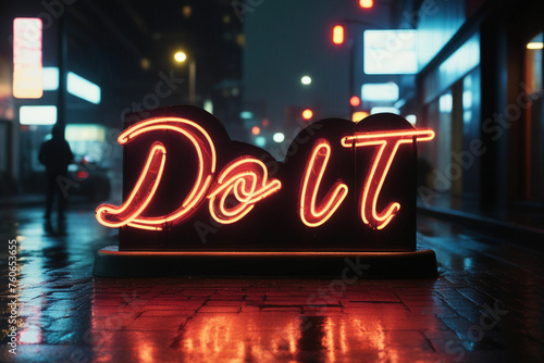 Slogan do it neon light sign text effect on a rainy night street, horizontal composition © Thanh