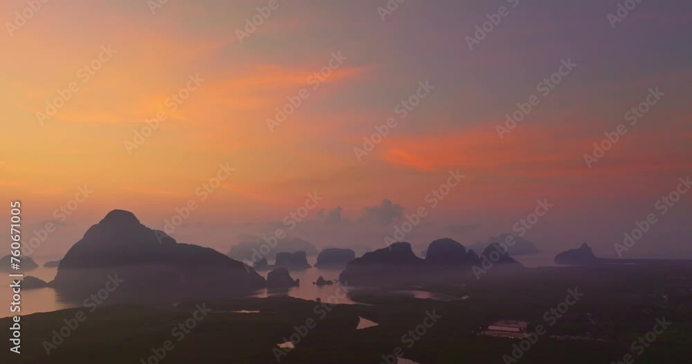 Aerial view Scenery High peaks wonderful pink sky at sunrise above Samed Nang Chee viewpoint. .tropical landscape background..scenery romantic sky of sweet sunrise above Samet Nangshe Islands. Aerial view Scenery High peaks wonderful pink sky at sunrise above Samed Nang Chee viewpoint. .tropical landscape background..scenery romantic sky of sweet sunrise above Samet Nangshe Islands.