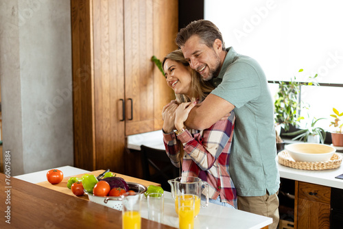 Man and woman share a warm ...