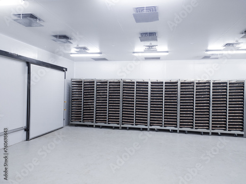  Several trolleys contain hatching eggs in the egg storage room so that the temperature of the eggs is maintained with Ceilling air vent on the cooling storage room before on hatching process.
 photo