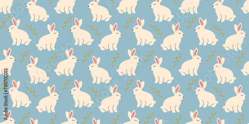 Bunny seamless pattern with leaves in doodle style. Endless Illustration with animals. White rabbits with botanical elements on blue background. Cute kids design