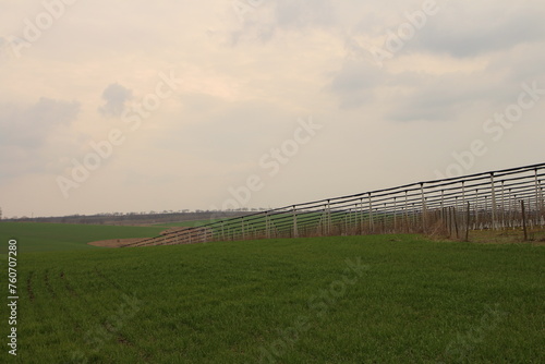 A fenced in field with a fence and a fence